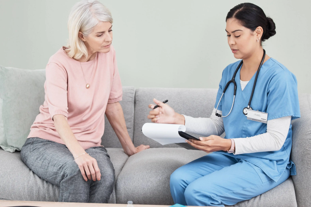 Direct Primary Care physician consulting with a patient during an office visit