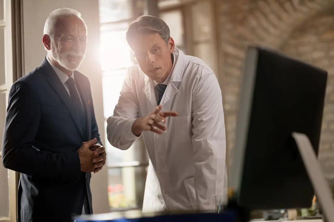 Doctor providing preventive care during a primary care appointment