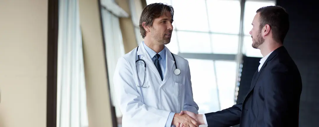 Primary care physician meeting with a patient to discuss value-based care